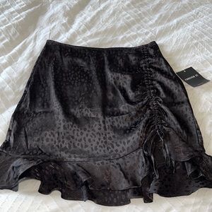 Black silky skirt